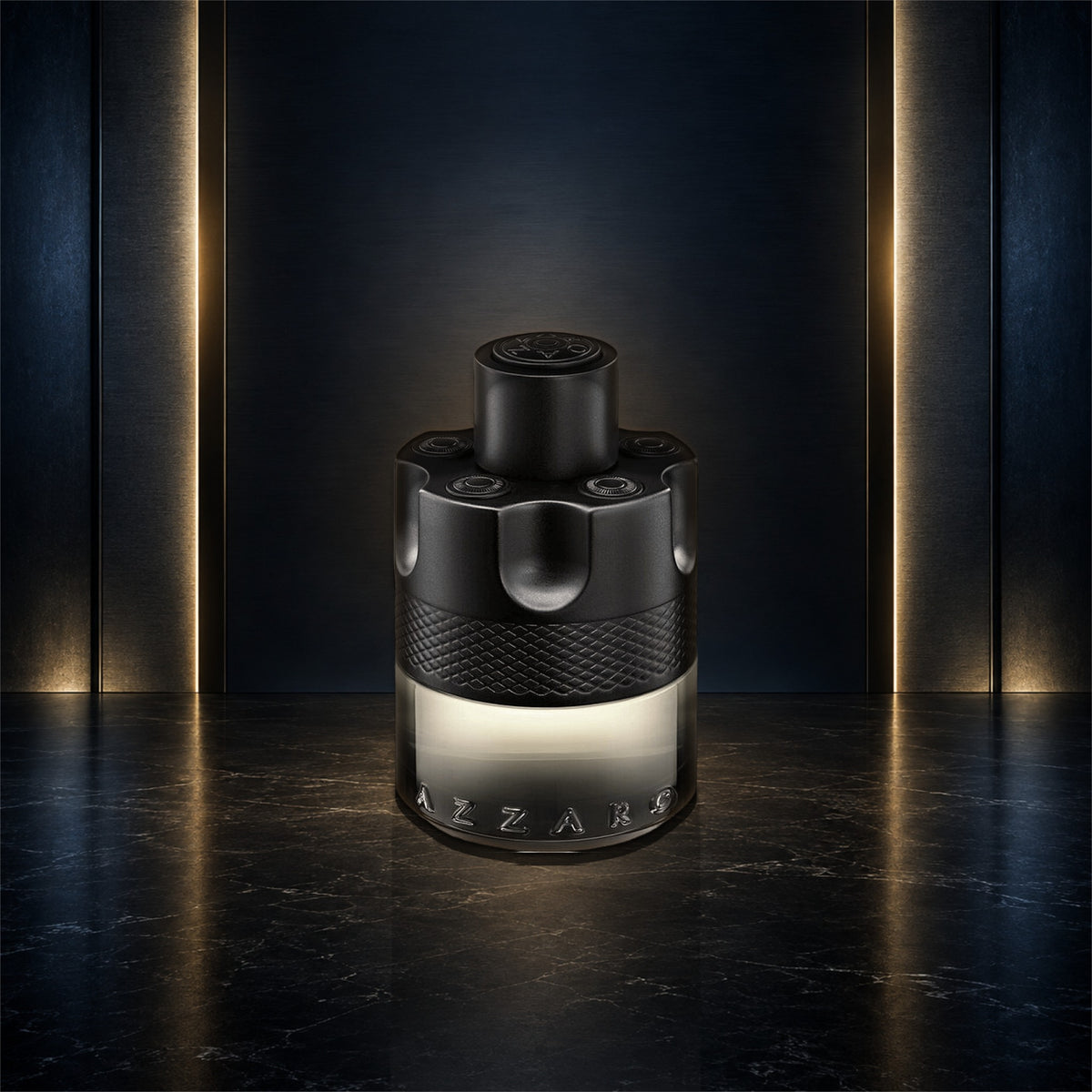 Azzaro The Most Wanted Eau de Toilette Intense 3.4 oz bottle on a navy, gunmetal, and gold studio background